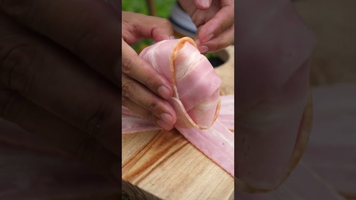 ベーコンとチーズの鉄板のヤーツ