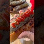 ジャンボハーブウインナーがデカすぎてホットドッグロールに収まらない！ #cooking #キャンプ飯 #アウトドアグルメ #japanesecamp #料理 #キャンプ飯 #shorts